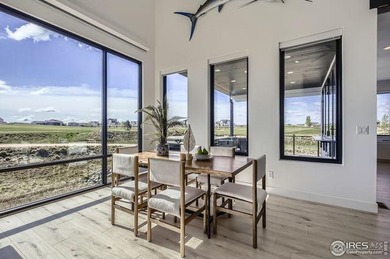 Welcome to elevated Colorado living at its finest. Perched above on Raindance National Golf Course in Colorado - for sale on GolfHomes.com, golf home, golf lot