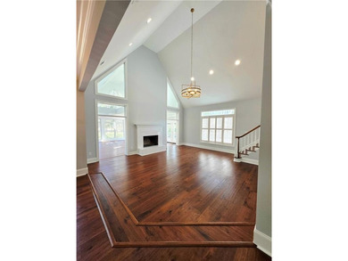 Perfectly positioned on the 18th tee box of the prestigious on Okefenokee Country Club in Georgia - for sale on GolfHomes.com, golf home, golf lot