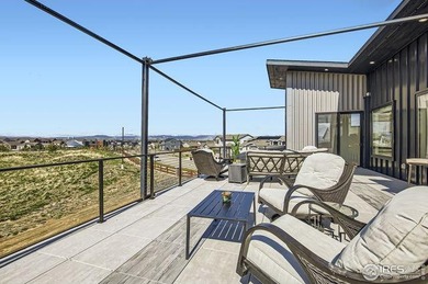 Welcome to elevated Colorado living at its finest. Perched above on Raindance National Golf Course in Colorado - for sale on GolfHomes.com, golf home, golf lot