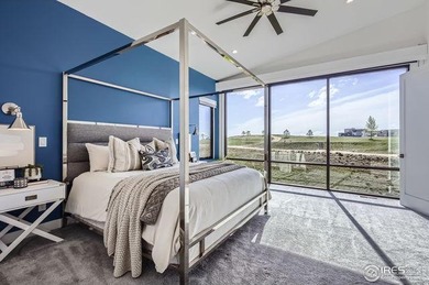 Welcome to elevated Colorado living at its finest. Perched above on Raindance National Golf Course in Colorado - for sale on GolfHomes.com, golf home, golf lot