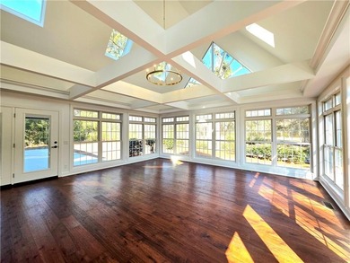 Perfectly positioned on the 18th tee box of the prestigious on Okefenokee Country Club in Georgia - for sale on GolfHomes.com, golf home, golf lot