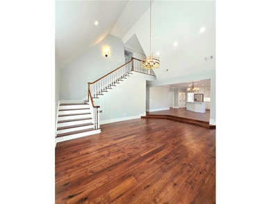 Perfectly positioned on the 18th tee box of the prestigious on Okefenokee Country Club in Georgia - for sale on GolfHomes.com, golf home, golf lot