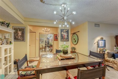 VERY WELL KEPT CONDO LARGER THAN THE TAX ROLLS WITH A RENOVATED on The Diplomat Golf Resort and Spa in Florida - for sale on GolfHomes.com, golf home, golf lot