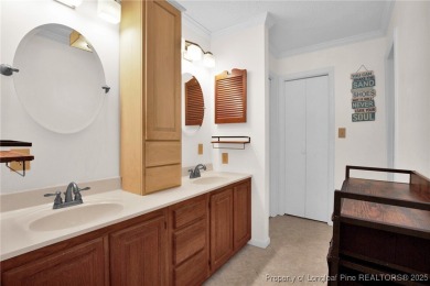 Welcome to 2948 Wedgeview Drive! This inviting 3-bedroom on Gates Four Golf and Country Club in North Carolina - for sale on GolfHomes.com, golf home, golf lot