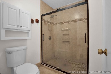 Welcome to 2948 Wedgeview Drive! This inviting 3-bedroom on Gates Four Golf and Country Club in North Carolina - for sale on GolfHomes.com, golf home, golf lot