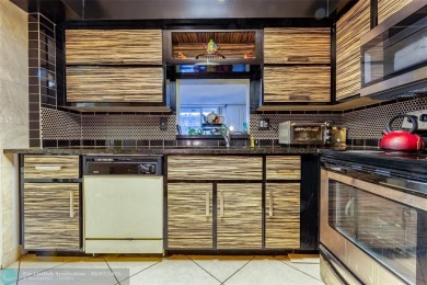 VERY WELL KEPT CONDO LARGER THAN THE TAX ROLLS WITH A RENOVATED on The Diplomat Golf Resort and Spa in Florida - for sale on GolfHomes.com, golf home, golf lot