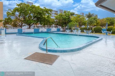 VERY WELL KEPT CONDO LARGER THAN THE TAX ROLLS WITH A RENOVATED on The Diplomat Golf Resort and Spa in Florida - for sale on GolfHomes.com, golf home, golf lot