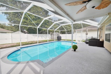 Captivating 4-Bedroom, Pool Home in the Sought-After Lake on The Links of Lake Bernadette in Florida - for sale on GolfHomes.com, golf home, golf lot