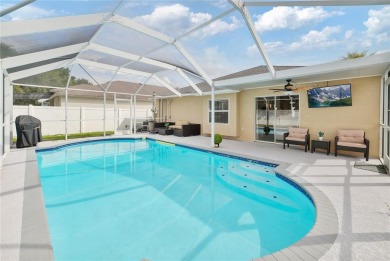 Captivating 4-Bedroom, Pool Home in the Sought-After Lake on The Links of Lake Bernadette in Florida - for sale on GolfHomes.com, golf home, golf lot