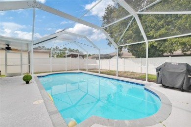 Captivating 4-Bedroom, Pool Home in the Sought-After Lake on The Links of Lake Bernadette in Florida - for sale on GolfHomes.com, golf home, golf lot