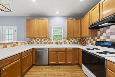 Don't miss this spacious 4BR/2.5BA gem on a beautifully on TPC at Wakefield Plantation in North Carolina - for sale on GolfHomes.com, golf home, golf lot