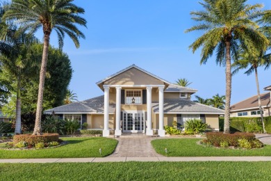 Enjoy lakefront sunsets from this elegant home in the gated on Greenview Cove Golf Club in Florida - for sale on GolfHomes.com, golf home, golf lot