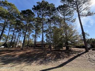 Build your dream home on this exceptional high-and-dry homesite on Sea Trail Golf Resort in North Carolina - for sale on GolfHomes.com, golf home, golf lot