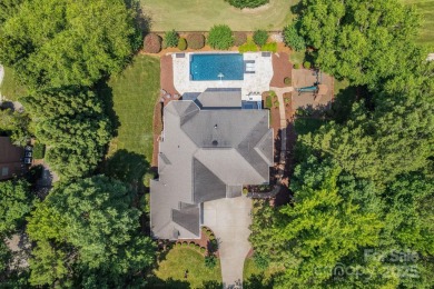 Welcome to your private paradise in Marvin! This stunning, fully on Firethorne Country Club in North Carolina - for sale on GolfHomes.com, golf home, golf lot