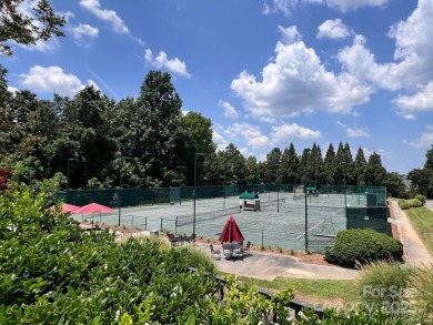 Welcome to your private paradise in Marvin! This stunning, fully on Firethorne Country Club in North Carolina - for sale on GolfHomes.com, golf home, golf lot