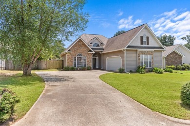 Explore This Stunning 3-Bedroom, 2-Bathroom Traditional Home! on Troy Country Club in Alabama - for sale on GolfHomes.com, golf home, golf lot