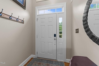 Spacious, elegant end-unit townhome with golf course view in on TPC at Wakefield Plantation in North Carolina - for sale on GolfHomes.com, golf home, golf lot