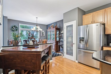 This beautifully maintained 2-bedroom, plus loft, 3.5-bath on Schaumburg Golf Club in Illinois - for sale on GolfHomes.com, golf home, golf lot