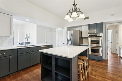 Fairway views, modern updates, and a peaceful setting on a quiet on Beau Chene Country Club in Louisiana - for sale on GolfHomes.com, golf home, golf lot