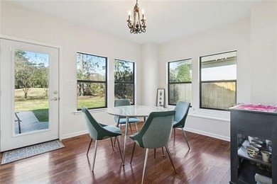 Fairway views, modern updates, and a peaceful setting on a quiet on Beau Chene Country Club in Louisiana - for sale on GolfHomes.com, golf home, golf lot