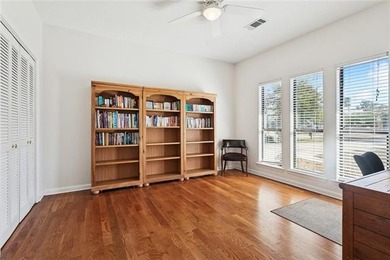 Fairway views, modern updates, and a peaceful setting on a quiet on Beau Chene Country Club in Louisiana - for sale on GolfHomes.com, golf home, golf lot