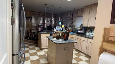 Look past the clutter and mess and overall this is a pretty cool on Firewheel Golf Park in Texas - for sale on GolfHomes.com, golf home, golf lot