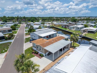 Were you searching for a WATERFRONT HOME with an 8,000 lb BOAT on Apollo Beach Golf and Sea Club in Florida - for sale on GolfHomes.com, golf home, golf lot