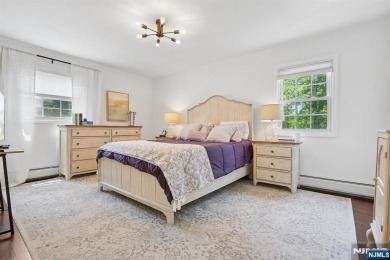 Enjoy this custom home nestled at the end of a quiet cul-de-sac on Crestmont Country Club in New Jersey - for sale on GolfHomes.com, golf home, golf lot