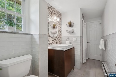 Enjoy this custom home nestled at the end of a quiet cul-de-sac on Crestmont Country Club in New Jersey - for sale on GolfHomes.com, golf home, golf lot
