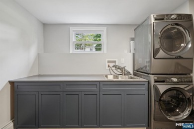 Enjoy this custom home nestled at the end of a quiet cul-de-sac on Crestmont Country Club in New Jersey - for sale on GolfHomes.com, golf home, golf lot
