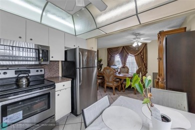 Priced to sell! Large Corner Unit! 2 bedroom/ 2 bathrooms, Lake on Flamingo Lakes Country Club in Florida - for sale on GolfHomes.com, golf home, golf lot