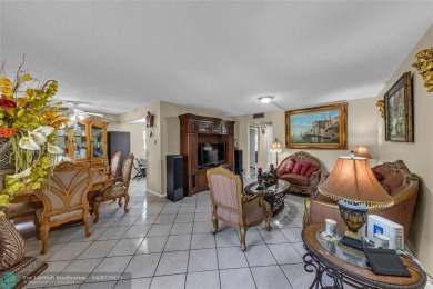 Priced to sell! Large Corner Unit! 2 bedroom/ 2 bathrooms, Lake on Flamingo Lakes Country Club in Florida - for sale on GolfHomes.com, golf home, golf lot