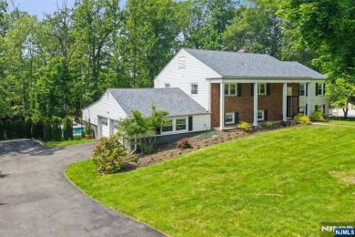 Enjoy this custom home nestled at the end of a quiet cul-de-sac on Crestmont Country Club in New Jersey - for sale on GolfHomes.com, golf home, golf lot