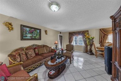 Priced to sell! Large Corner Unit! 2 bedroom/ 2 bathrooms, Lake on Flamingo Lakes Country Club in Florida - for sale on GolfHomes.com, golf home, golf lot