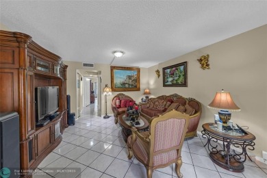 Priced to sell! Large Corner Unit! 2 bedroom/ 2 bathrooms, Lake on Flamingo Lakes Country Club in Florida - for sale on GolfHomes.com, golf home, golf lot