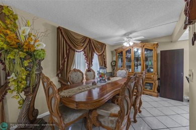 Priced to sell! Large Corner Unit! 2 bedroom/ 2 bathrooms, Lake on Flamingo Lakes Country Club in Florida - for sale on GolfHomes.com, golf home, golf lot