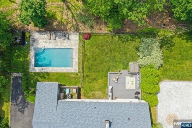 Enjoy this custom home nestled at the end of a quiet cul-de-sac on Crestmont Country Club in New Jersey - for sale on GolfHomes.com, golf home, golf lot