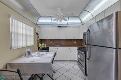 Priced to sell! Large Corner Unit! 2 bedroom/ 2 bathrooms, Lake on Flamingo Lakes Country Club in Florida - for sale on GolfHomes.com, golf home, golf lot