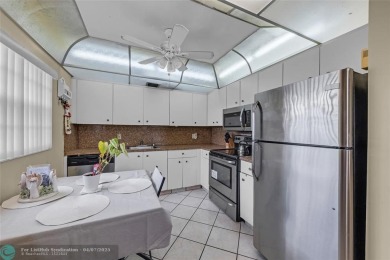 Priced to sell! Large Corner Unit! 2 bedroom/ 2 bathrooms, Lake on Flamingo Lakes Country Club in Florida - for sale on GolfHomes.com, golf home, golf lot