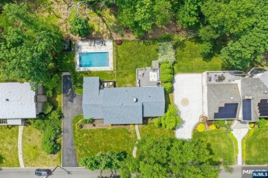 Enjoy this custom home nestled at the end of a quiet cul-de-sac on Crestmont Country Club in New Jersey - for sale on GolfHomes.com, golf home, golf lot