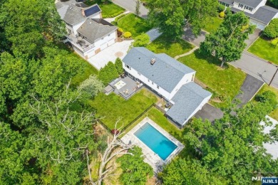 Enjoy this custom home nestled at the end of a quiet cul-de-sac on Crestmont Country Club in New Jersey - for sale on GolfHomes.com, golf home, golf lot