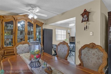 Priced to sell! Large Corner Unit! 2 bedroom/ 2 bathrooms, Lake on Flamingo Lakes Country Club in Florida - for sale on GolfHomes.com, golf home, golf lot