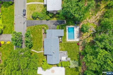 Enjoy this custom home nestled at the end of a quiet cul-de-sac on Crestmont Country Club in New Jersey - for sale on GolfHomes.com, golf home, golf lot