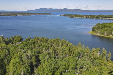 This parcel of waterfront land is perched up and out of the on Tarratine Golf Club in Maine - for sale on GolfHomes.com, golf home, golf lot