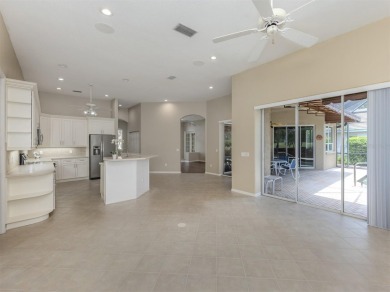 Stunning residence that's filled with natural light and on The Venice Golf and Country Club in Florida - for sale on GolfHomes.com, golf home, golf lot