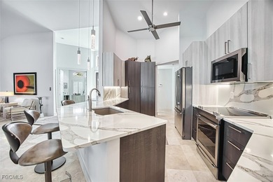 Sweeping water views will greet you when you walk into this on The Dunes Golf and Tennis Club in Florida - for sale on GolfHomes.com, golf home, golf lot