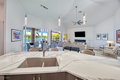 Sweeping water views will greet you when you walk into this on The Dunes Golf and Tennis Club in Florida - for sale on GolfHomes.com, golf home, golf lot