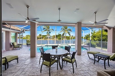 Sweeping water views will greet you when you walk into this on The Dunes Golf and Tennis Club in Florida - for sale on GolfHomes.com, golf home, golf lot