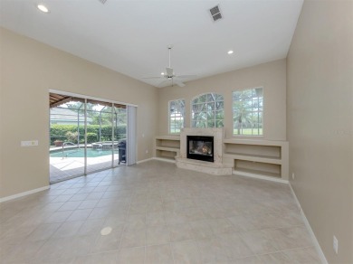 Stunning residence that's filled with natural light and on The Venice Golf and Country Club in Florida - for sale on GolfHomes.com, golf home, golf lot