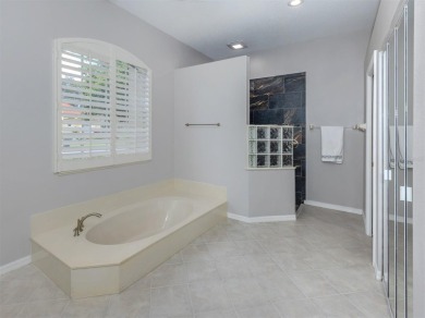 Stunning residence that's filled with natural light and on The Venice Golf and Country Club in Florida - for sale on GolfHomes.com, golf home, golf lot